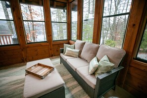 Smart TV, fireplace, books, printers