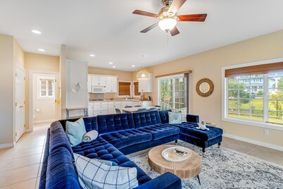 Charming coastal home close to the beach with a fireplace, yard, & W/D