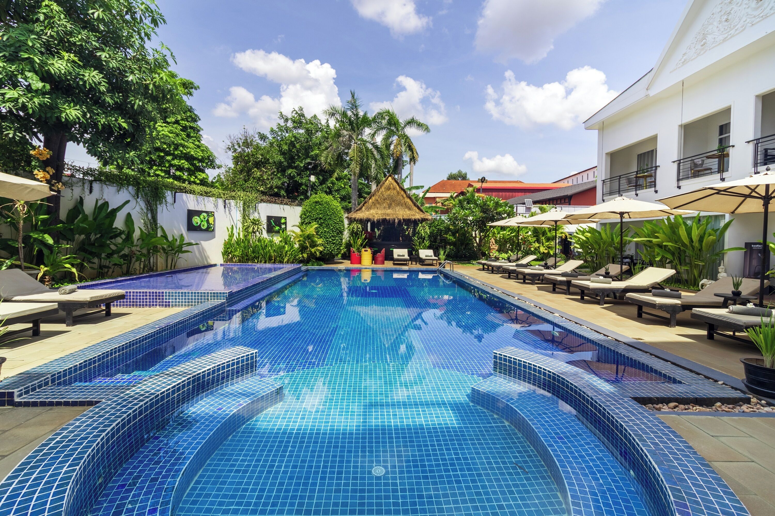Outdoor pool, open 7:00 AM to 7:00 PM, pool umbrellas, sun loungers