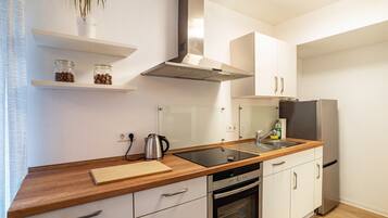 Refrigerador, horno, placa de cocina, lavavajillas