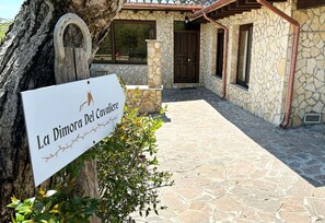 La Dimora Del Cavalle offers a charming stone facade and a welcoming entrance.