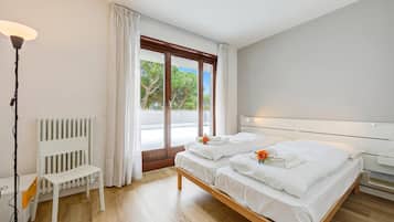 Apartemen Keluarga, 2 kamar tidur, teras (Balcone Sui Tigli - Apartment with) | 2 kamar tidur dan Wi-Fi