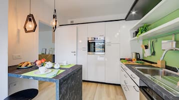 Family Apartment, 2 Bedrooms (Balcone Sui Tigli Few Min From The) | Private kitchen | Fridge, oven, stovetop, dishwasher