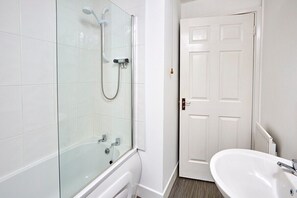 Shower, towels, soap, toilet paper