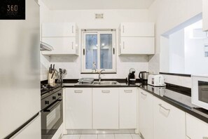 Fridge, microwave, oven, coffee/tea maker