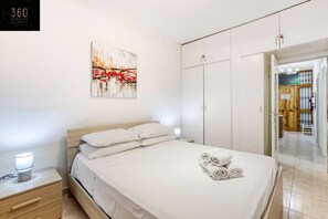 3 bedrooms, desk, iron/ironing board, travel cot