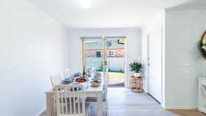 Dining - Pet friendly Driftwood Cottage, 1-28 Farm Rd - W-Fi, Air Con and ground floor (Fingal Bay)