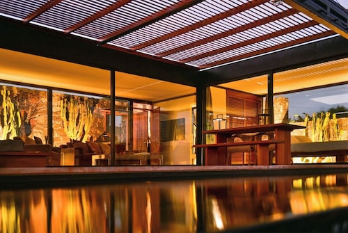 Wake up to nature in this modern glass house