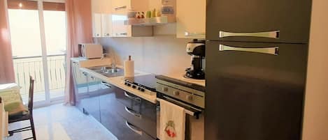 Apartment | Private kitchen | Full-sized fridge, microwave, oven, stovetop
