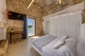 1 غرفة نوم ومكواة/لوح كي وخدمة الإنترنت وملاءات أسرّة