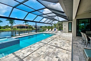A heated pool - Azure Paradise | Canal View | Dock | 2 Masters | Spa (Port Charlotte)