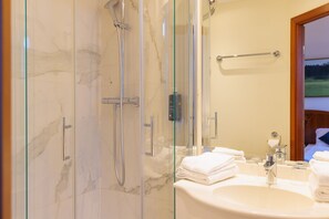 Hair dryer, towels, soap, shampoo