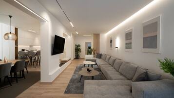 Luxury Apartment | Living area | 65-inch Smart TV with cable channels, TV