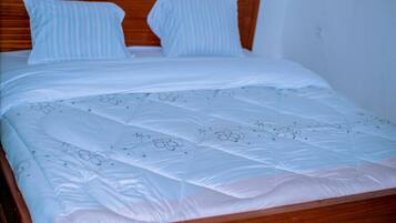 Desk, laptop workspace, free WiFi, bed sheets