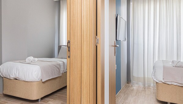 Apartamento standard, 2 quartos, cozinha | Escrivaninha, espaço de trabalho para notebook, quartos à prova de som