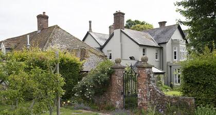 A former hotel set deep in the Dorset countryside in a small village