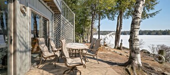 Winnipesaukee Waterfront Home sleeping 12 dock and sandy beach