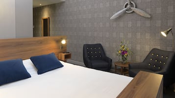 Suite junior | 1 dormitorio, ropa de cama de alta calidad, escritorio