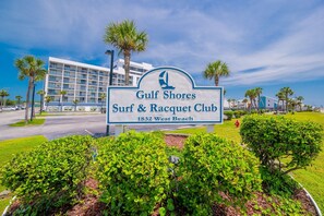 A sign for Gulf Shores Surf & Racquet Club at 1832 West Beach.