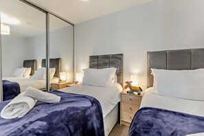 2 多间卧室、旅行婴儿床、免费 WiFi、床单