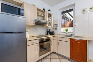 Apartment, 1 Schlafzimmer, Terrasse, Meerseite | Eigene Küche | Mikrowelle, Geschirrspüler, Wasserkocher mit Kaffee-/Teezubehör