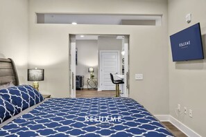 1 bedroom, desk, iron/ironing board, travel cot