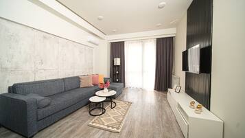 Superior Apartment, 1 Bedroom, Non Smoking, Balcony | Living area | 59-inch Smart TV with cable channels, TV