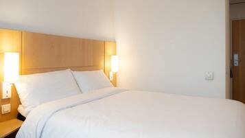 Desk, laptop workspace, blackout curtains, free WiFi