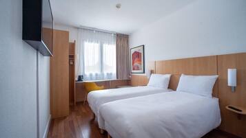 Desk, laptop workspace, blackout curtains, free WiFi