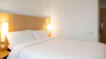 Desk, laptop workspace, blackout curtains, free WiFi