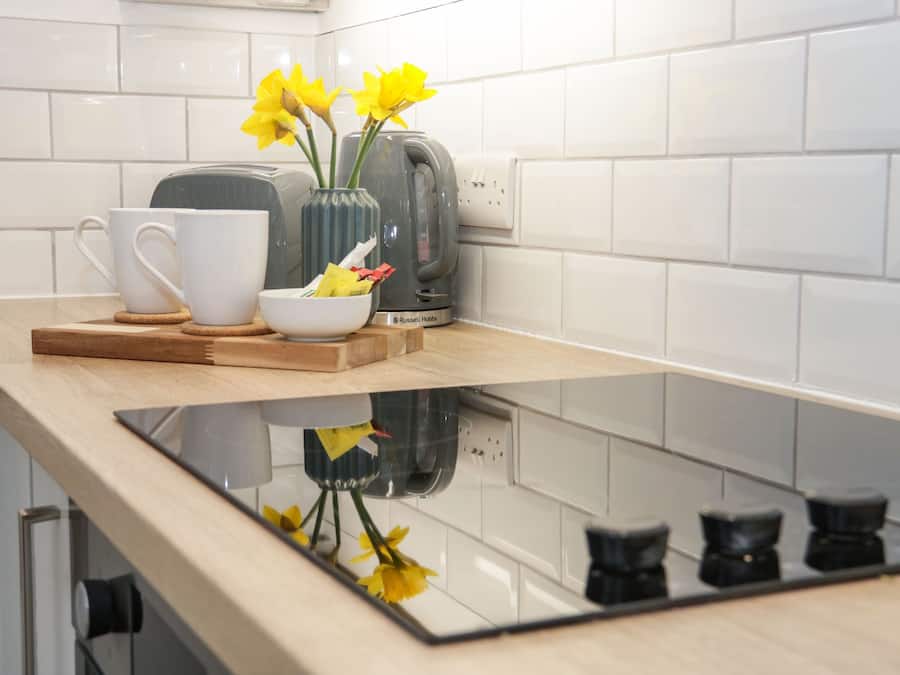 Fridge, electric kettle, toaster, cookware/dishes/utensils