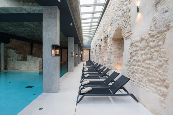 Indoor pool, seasonal outdoor pool, pool loungers