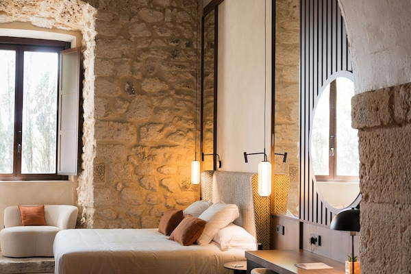 Premium bedding, down duvets, minibar, in-room safe