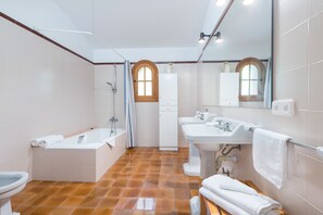 Bathtub, hair dryer, towels
