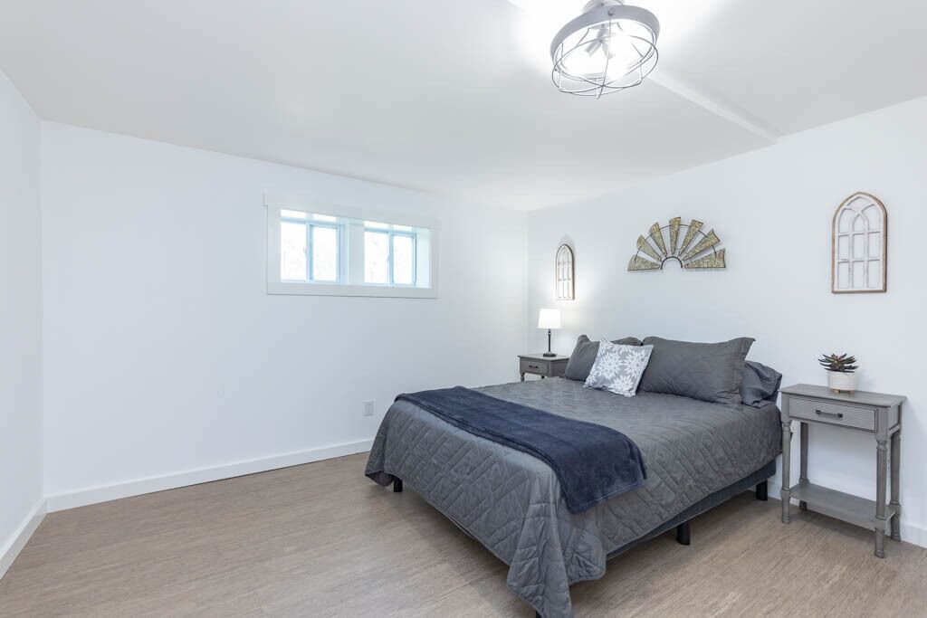 Bedroom with queen-sized bed.
