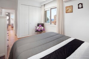 2 slaapkamers, een strijkplank/strijkijzer, gratis wifi, beddengoed
