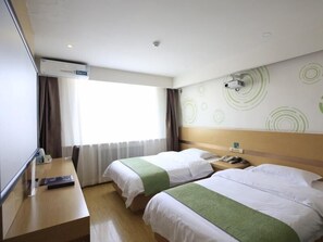 A hotel room with two beds, a desk, a chair, a TV, and a window with curtains. - Greentree Inn Taiyuan Metro Jianhe Station Beigong Express Hotel (Taiyuan)