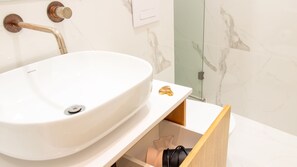 Hair dryer, towels, soap, shampoo