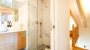 Hair dryer, towels, soap, shampoo