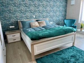 2 dormitorios, tabla de planchar con plancha, wifi gratis y ropa de cama