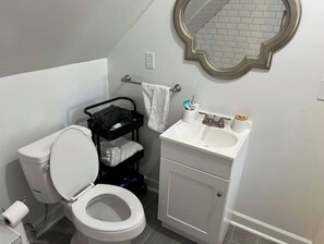 Hair dryer, towels, soap, shampoo