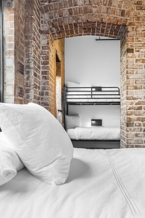 Queen Bunk Room | Premium bedding, down comforters, individually decorated - The Literary Hotel (Solon)