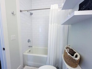 Hair dryer, towels, soap, shampoo