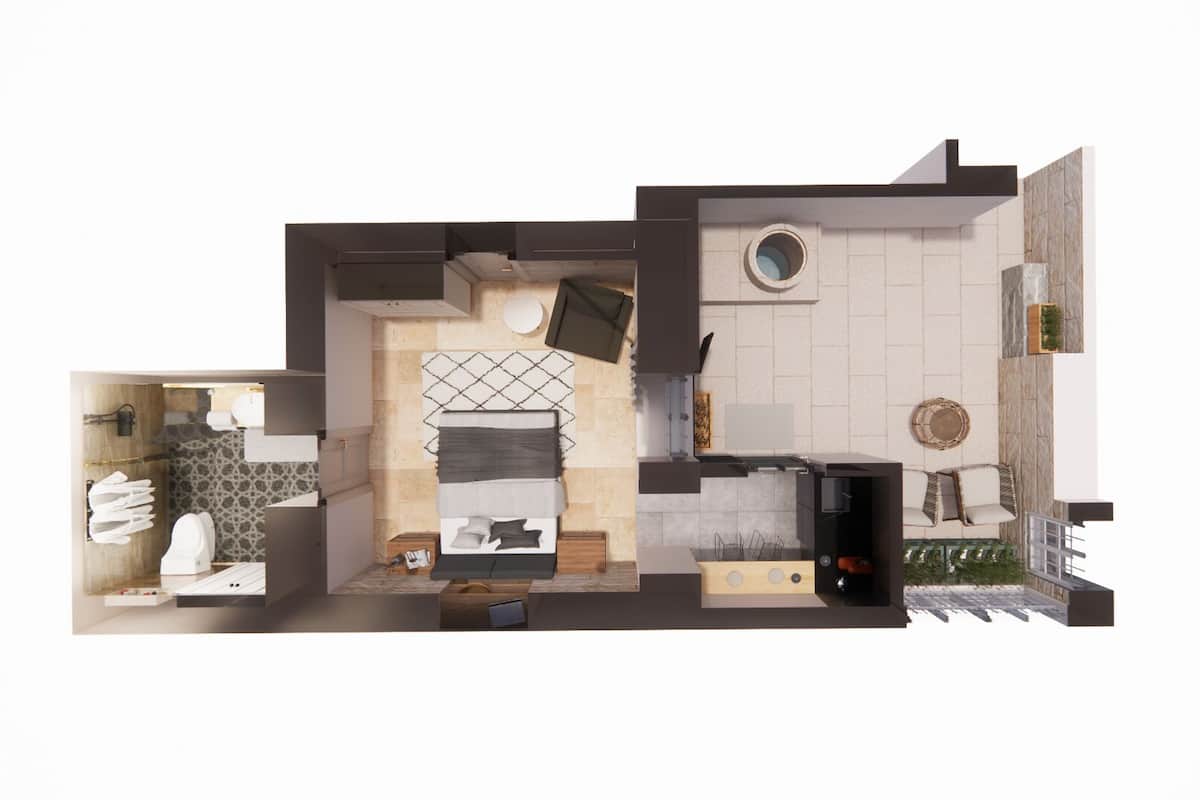 Un appartement de deux chambres comprenant une cuisine, un espace de vie et un petit balcon.