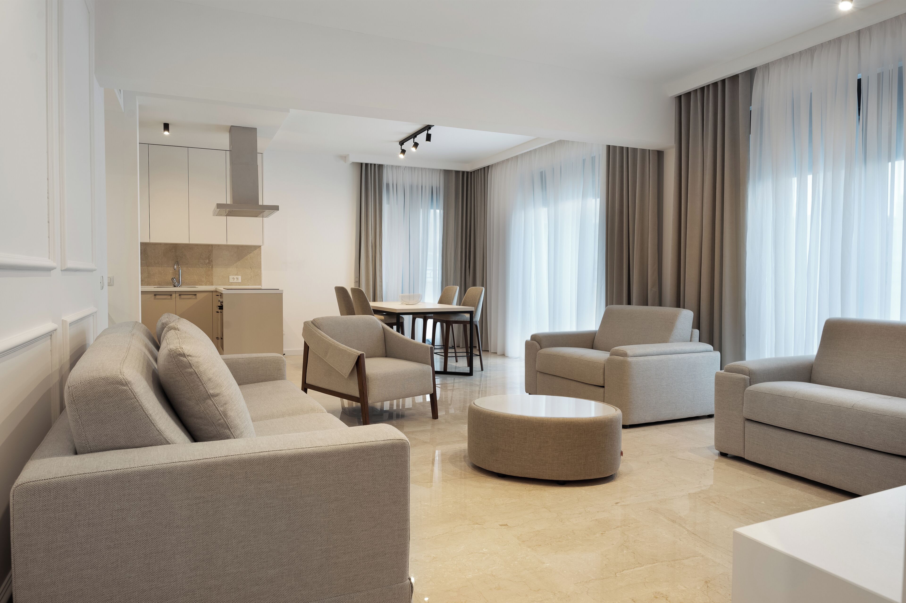 Junior Suite, 2 Bedrooms | Living area | 55-inch Smart TV with cable channels, TV