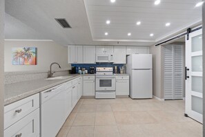 Fridge, microwave, oven, stovetop - Pool is Open- Beach Cottage 1214, Gulf Front 3BR 2BA, Htd Pool Hot Tub Sleeps 11 (Indian Shores)