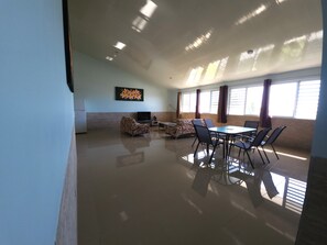 Apartamento Deluxe | Zona de estar
