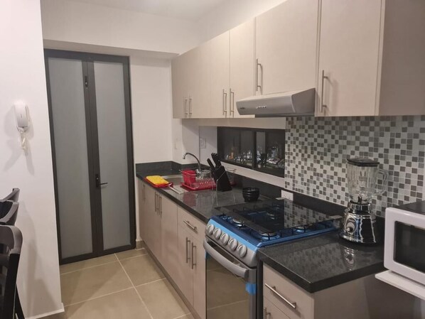 Fridge, microwave, oven, stovetop