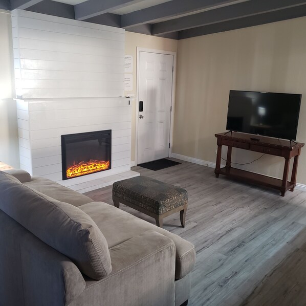 Smart TV, fireplace, foosball