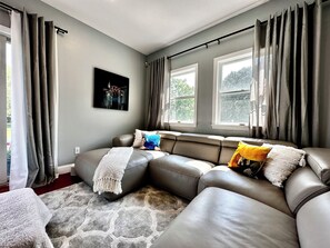 Smart TV, fireplace, foosball, books